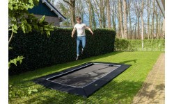 EXIT Dynamic ground level trampoline 275x458cm with Freezone safety tiles - black