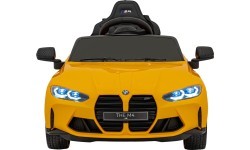 Электромобиль BMW M4, жёлтый