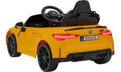 Электромобиль BMW M4, жёлтый