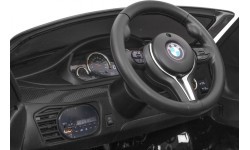 Elektromobilis BMW X6M, lakuotas juodas