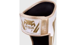 Защита голени Venum Elite Standup - белая/золотая
