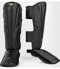 Venum Impact Evo blauzdų apsaugos – juodos