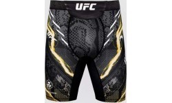 Шорты Vale Tudo UFC Adrenaline Unrivaled by Venum для мужчин, черно-золотые, Israel Adesanya