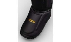 Venum Streamline blauzdų apsaugos, juodos/auksinės