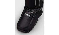 Venum Stealth blauzdų apsaugos – juodos/baltos