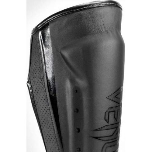 Venum Elite Evo blauzdų apsaugos, juodos/juodos