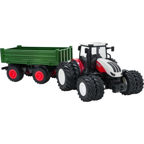 Raudonas nuotoliniu būdu valdomas traktorius su žalia puspriekabe
